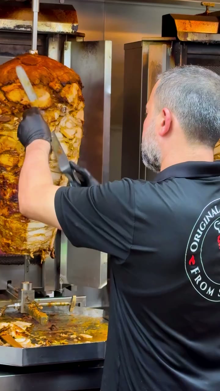 Fresh shawarma being carved in our kitchen